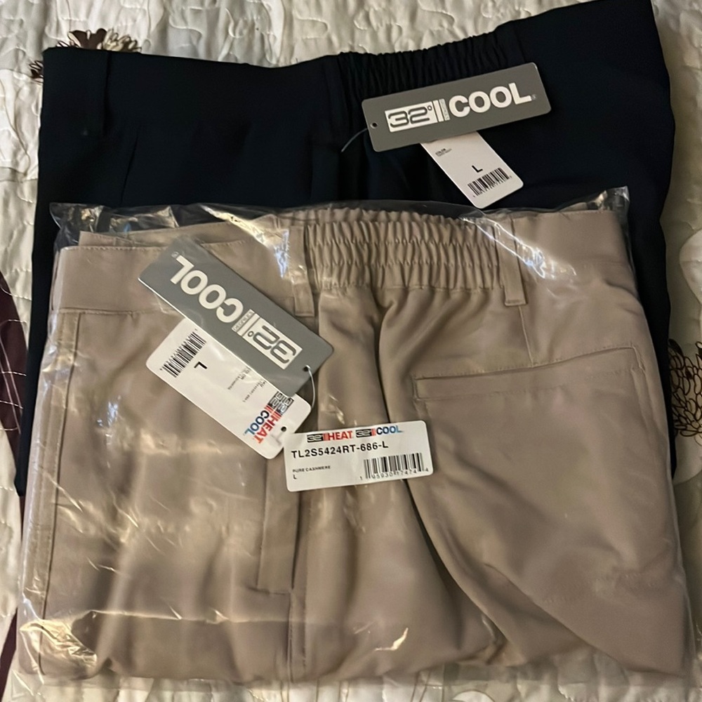 2 pair of women’s golf shirts. Size L. Cool 32•. Never worn.